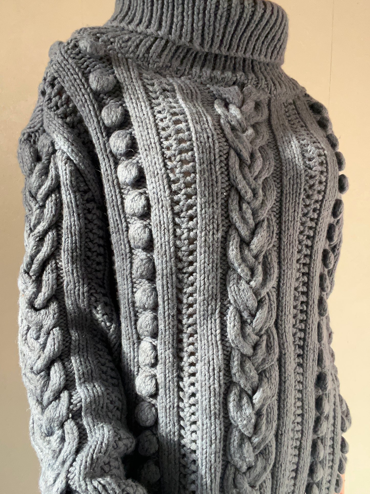 Pull col roulé torsadé