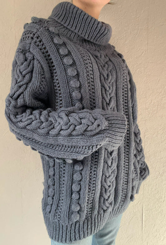 Pull col roulé torsadé