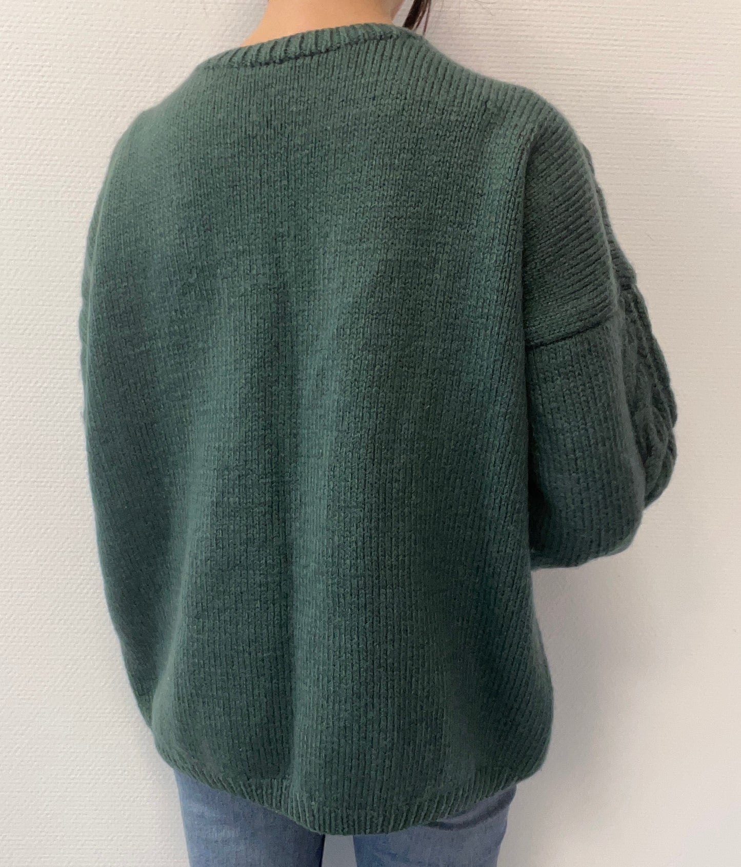 Pull torsadé en tricot