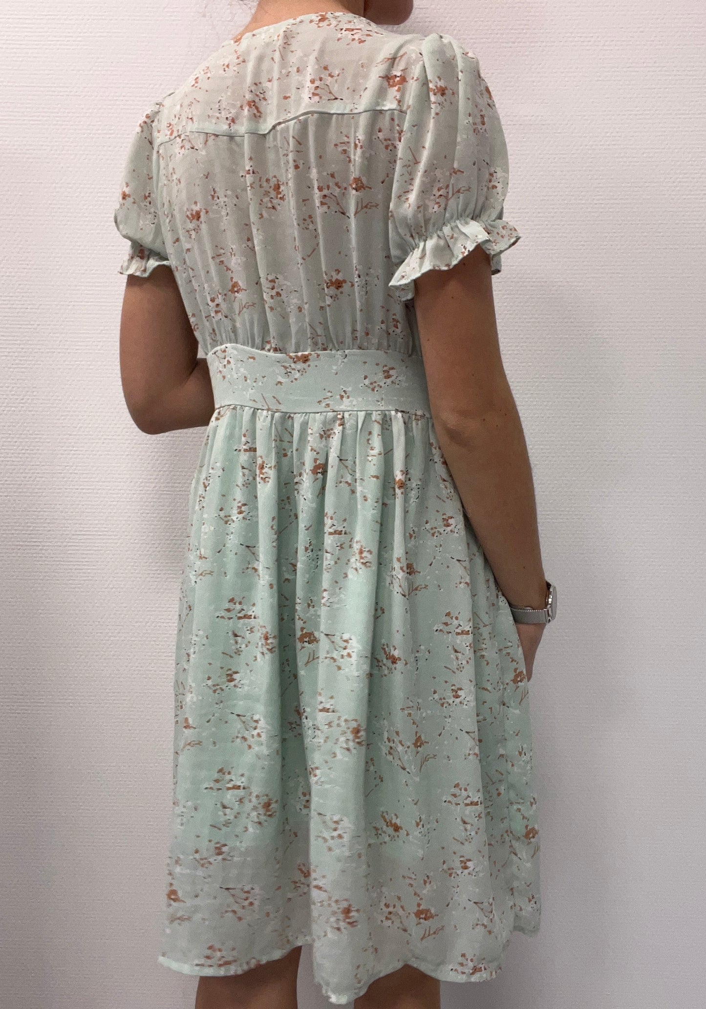 Robe menthe à boutons